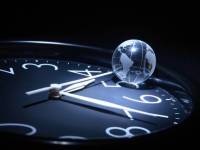 bigstockphoto_Globe_On_Clock_4085677(2)